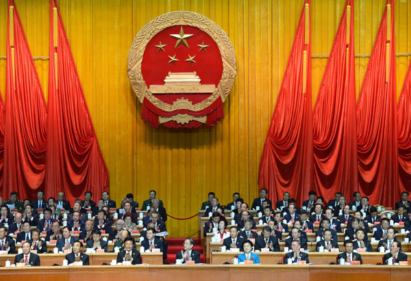 10月1日，慶祝中華人民共和國成立66周年暨新疆維吾爾自治區(qū)成立60周年大會在新疆人民會堂隆重舉行。 新華社記者 高潔 攝 