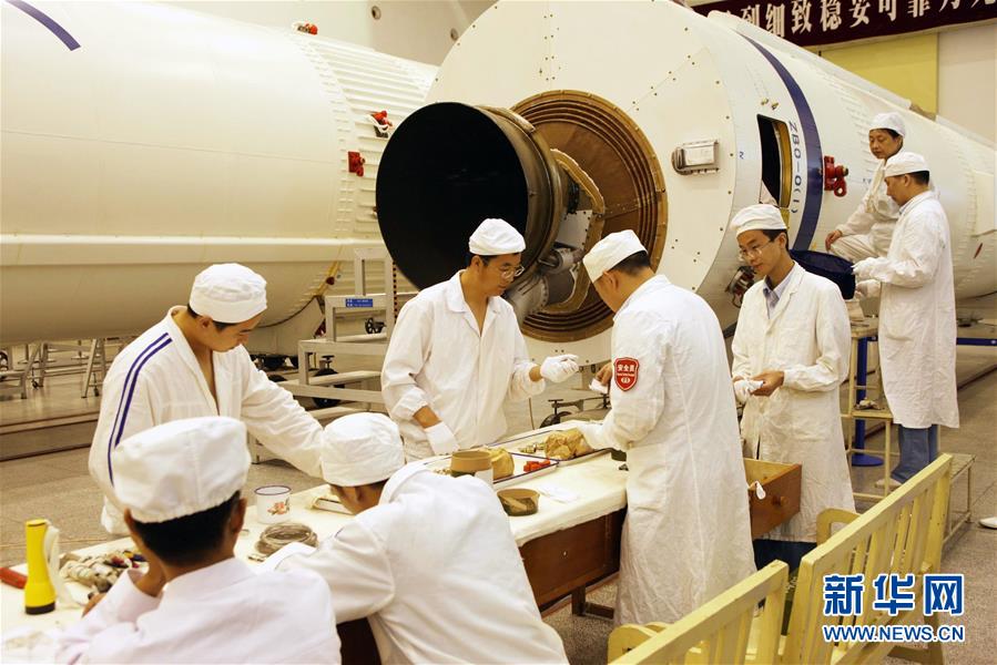 （建黨97周年·圖文互動）（2）“金牌火箭”背后的“金牌火箭人”——記長征三號甲系列運載火箭研發團隊 