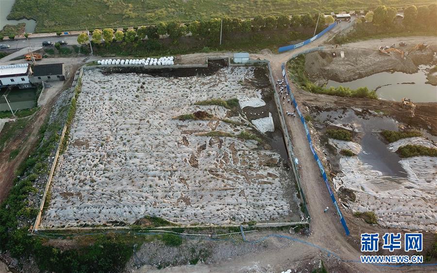 （新華視點·圖文互動）（1）中央督察兩年有的絲毫未改，有的不減反增——江蘇泰興數(shù)萬噸化工廢料和污泥堆放長江邊調(diào)查