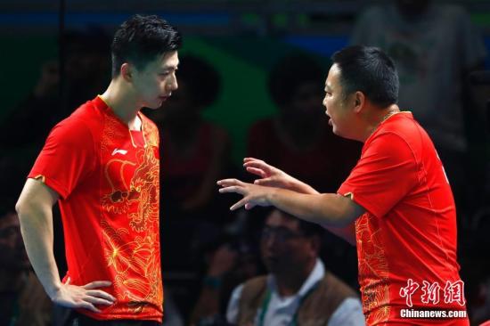 圖為教練劉國梁在場邊指導。<a target='_blank'  ><p  align=