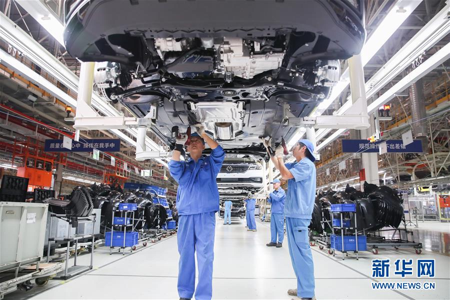 (百城百縣百企調研行·圖文互動)(2)上海汽車集團走出“中國紅”道路
