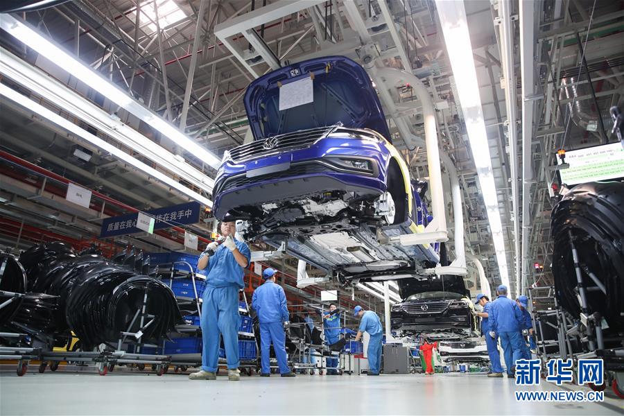 (百城百縣百企調研行·圖文互動)(3)上海汽車集團走出“中國紅”道路