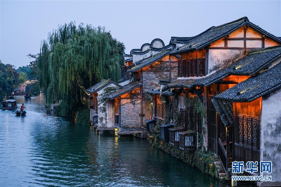 （慶祝改革開放40周年基層行·鄉鎮篇·圖文互動）（1）烏鎮40年：根里的靜與脈中的動