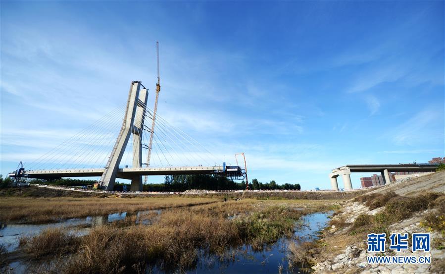 (在習(xí)近平新時(shí)代中國(guó)特色社會(huì)主義思想指引下——新時(shí)代新作為新篇章·圖文互動(dòng))(1)梗阻的“血脈”通了 彼此的心拉近了——京津冀“斷頭路”打通記