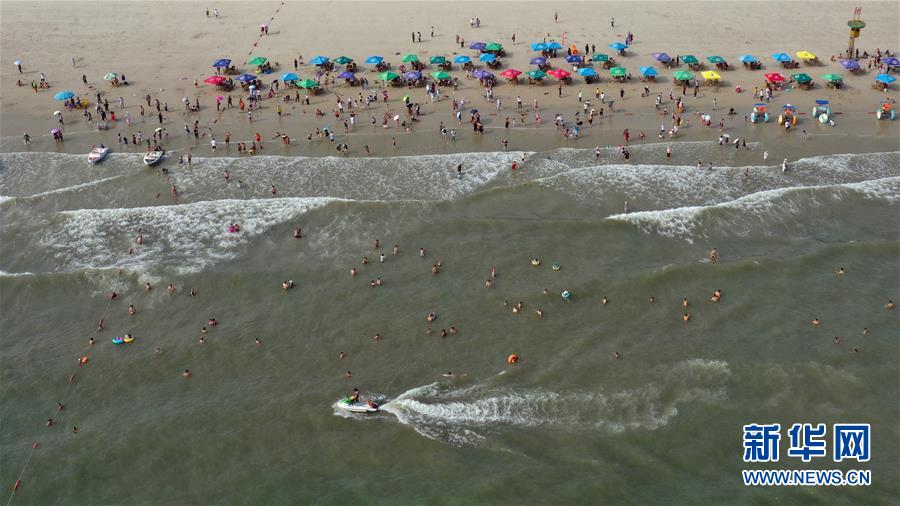 (壯麗70年 奮斗新時代——推動高質量發展調研行·圖文互動)(3)近海能看鯨魚白海豚,廣西這片濱海旅游勝地啥來頭?