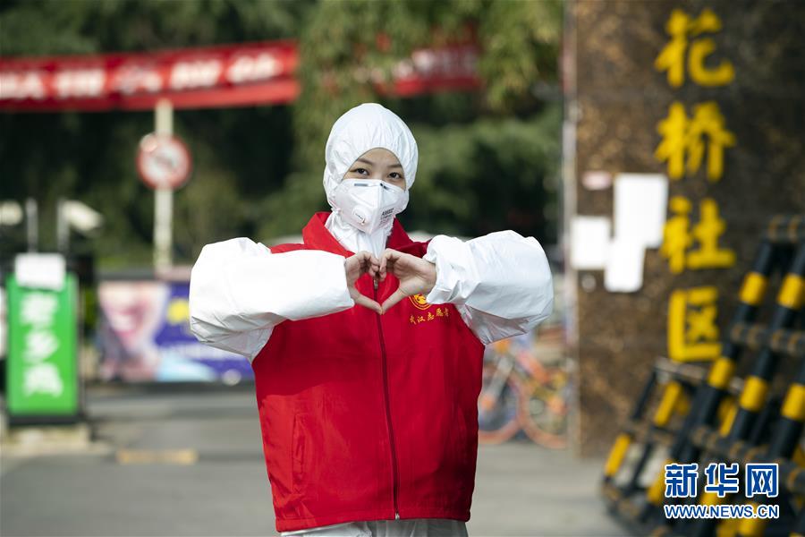 (新華全媒頭條·圖文互動)(14)星火成炬——記戰“疫”中的志愿服務英雄