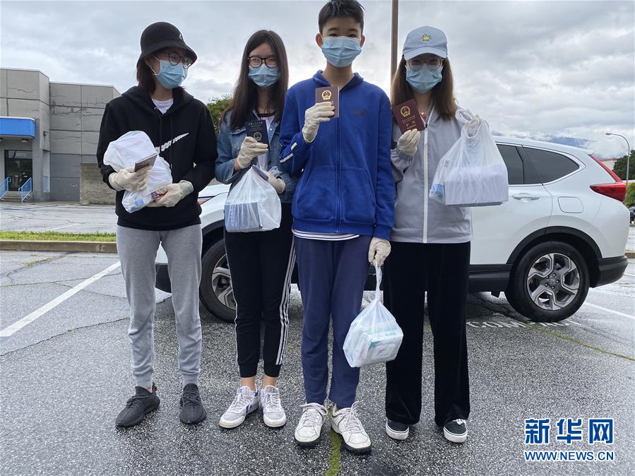 (國際疫情·圖文互動)(4)“來自祖國濃濃的愛”——在美留學生領取“健康包”背后的故事