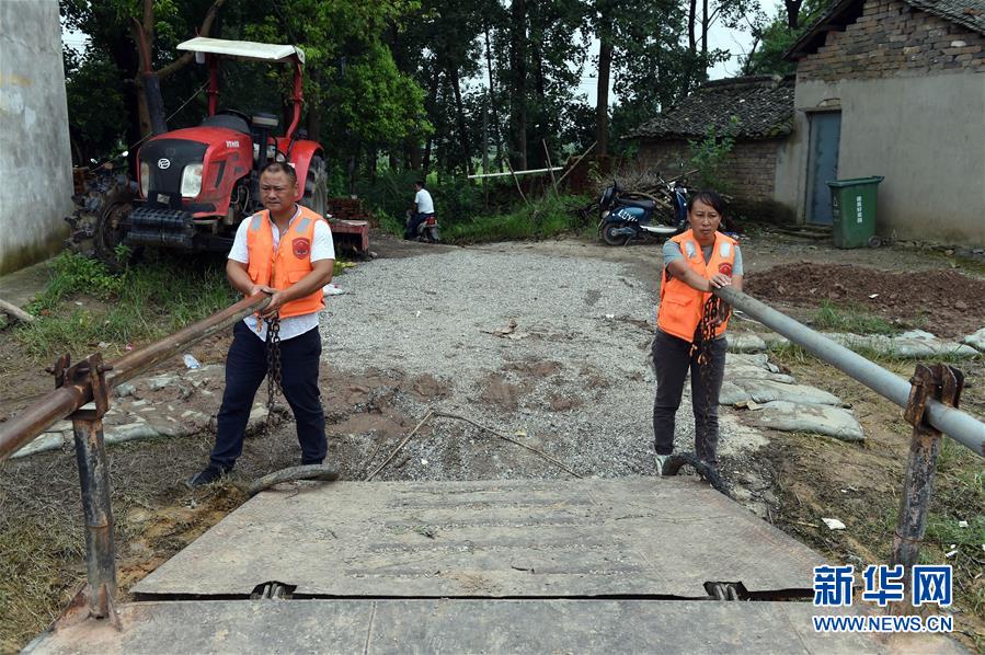 (新華全媒頭條·圖文互動)(7)筑起共御水患的鋼鐵長堤——戰洪一線的“干群關系新答卷”