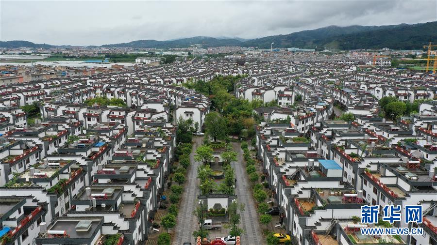 (走向我們的小康生活·圖文互動)(1)“云南第一村”,共同富裕為什么能?