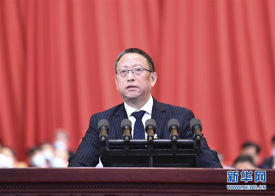 (兩會·政協開幕·XHDW)鄭建邦代表政協第十三屆全國委員會常務委員會作提案工作情況的報告