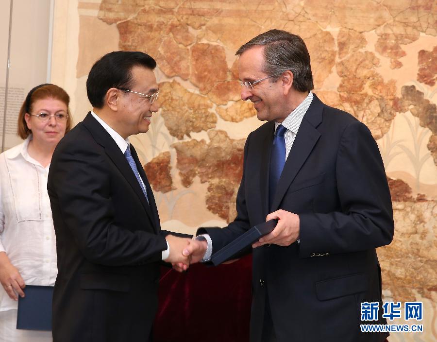 6月21日，國務(wù)院總理李克強與希臘總理薩馬拉斯共同出席希臘伊拉克利翁博物館新館開館儀式并發(fā)表講話。 新華社記者 龐興雷 攝