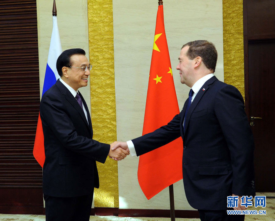 12月15日，中國(guó)國(guó)務(wù)院總理李克強(qiáng)在阿斯塔納會(huì)見俄羅斯總理梅德韋杰夫。 新華社記者 饒愛民 攝