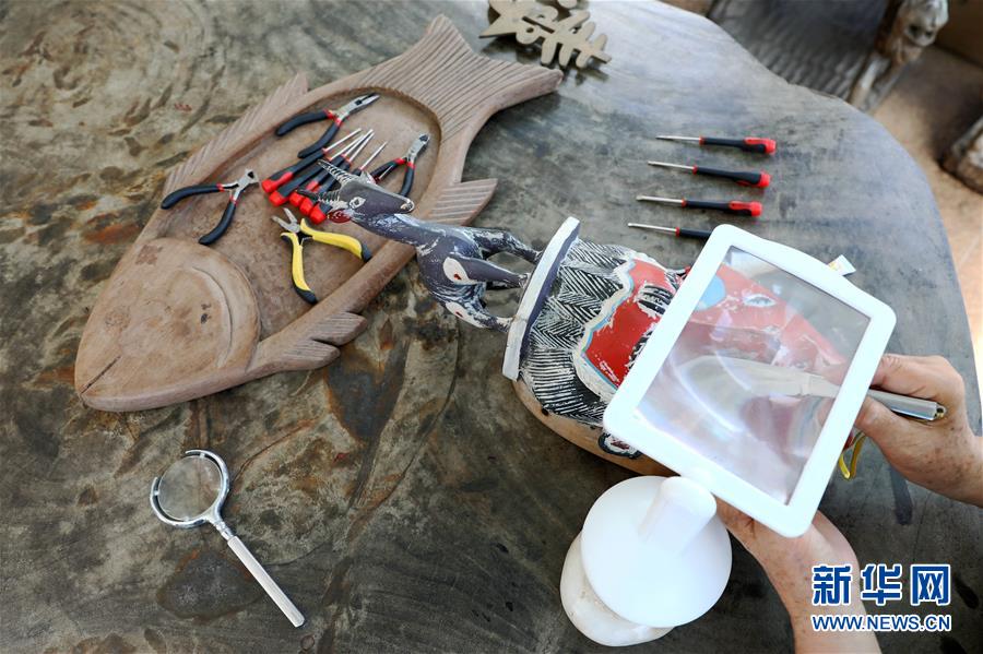 (國際·圖文互動)(6)通訊:收藏“非洲之美”的中國人——訪幾內亞灣非洲國際藝術博物館館長謝燕申