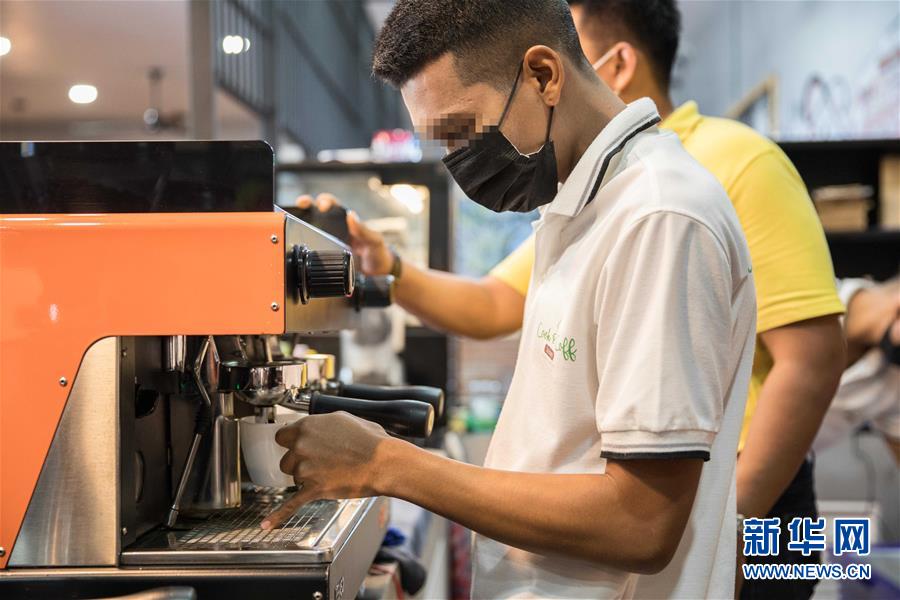 (國際·圖文互動)(5)走進泰國社區的“監獄咖啡館”