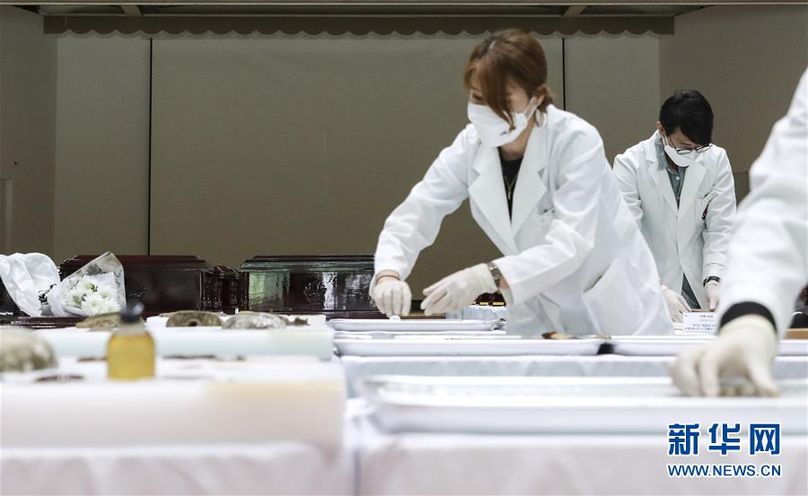 (國際)(2)第七批在韓中國人民志愿軍烈士遺骸裝殮儀式舉行